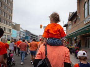 Orange shirts have become a symbol of remembrance for Canada's legacy of residential schools.  Sept. 30, commonly known as Orange Shirt Day,  was made a federal statutory holiday in 2021.