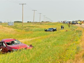 A red car drove the wrong way through a construction zone on Highway 16 east of Maymont, Sask. on July 26 striking a second red car (seen in the foreground) and sideswiping a black car before entering the ditch and rolling. Bystander photo posted to Facebook by user Allan Barilla.