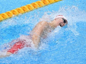 Canada's Penny Oleksiak competes in a heat for the women's 100m freestyle swimming event during the Tokyo 2020 Olympic Games at the Tokyo Aquatics Centre in Tokyo on July 28, 2021.