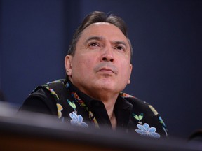 Assembly of First Nations (AFN) National Chief Perry Bellegarde is joined by First Nations leaders at a press conference at the National Press Theatre in Ottawa on Tuesday, Feb. 18, 2020.