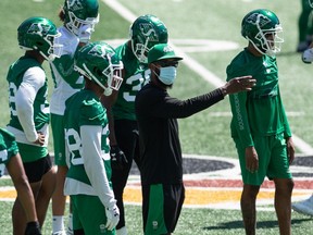 Although the final COVID restrictions have been lifted across the province, the Saskatchewan Roughriders' coaches — including defensive co-ordinator Jason Shivers, shown on Monday — are continuing to wear masks during training camp, per the CFL's COVID-19 protocol.