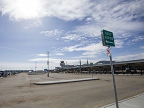 Short term parking at the John G. Diefenbaker International Airport is nearly empty in the wake of reduced flights and increased restrictions on air travel on Monday, April 20, 2020.