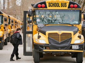 High school students leave Beal Secondary School in London, Ontario on March 13, 2020 on their last day of classes before a 3 week break imposed by the Ontario government to slow the spread of the novel coronavirus, COVID-19.