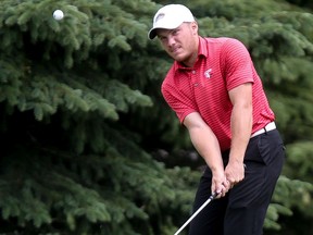 Justin Wood chips in his ball during the North Ridge Saskatoon Amateur Golf Championship at Riverside Golf and County Club in Saskatoon on June 26, 2017.