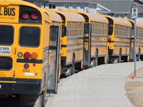 School buses are lined up at Ecole Wascana Plains School in Regina on May 3, 2021.