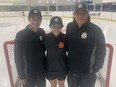 Sydney Daniels (centre) stands with her father, former NHLer Scott Daniels (right) and cousin Colby Daniels.