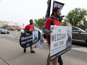 Members of the Ahmadiyya Muslim Youth Association are travelling to various cities and towns across Canada in a mobile exhibition to have discussions with local residents to remove misconceptions about Islam. Photo taken in Saskatoon, Sask. on Thursday, August 19, 2021.