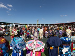 ONE ARROW FIRST NATION, SK-- August 21/2021 - 0822 news one arrow powwow - Dancers join in the grand entry at the One Arrow First Nation powwow, where Bill Waiser will be launching his book ÒIn Search of Almighty Voice: Resistance and ReconciliationÓ. Photo taken at One Arrow First Nation, Sask. on Saturday, August 21, 2021.