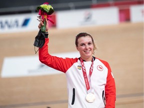 Bronze medallist Canada's Keely Shaw poses with her medal on the podium after the women's C4 3000m individual pursuit event during the Tokyo 2020 Paralympic Games at Izu Velodrome in Izu on August 25, 2021.