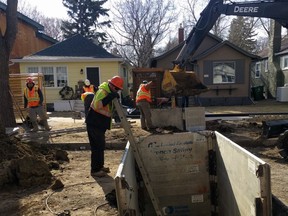 A crew works to replace a lead water connector line in this undated handout photo supplied by the City of Saskatoon.