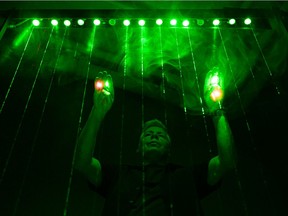Rich Miller plays his laser harp in preparation for his instalment at the Nuit Blanche festival in Saskatoon on Sept. 25.