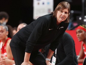 Coach Lisa Thomaidis of Team Canada looks on as her team plays Serbia at the 2020 Tokyo Olympics.