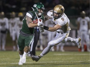 Huskies' runnning back Adam Machart carries the ball against Manitoba in their last meeting on Oct. 4, 2019.