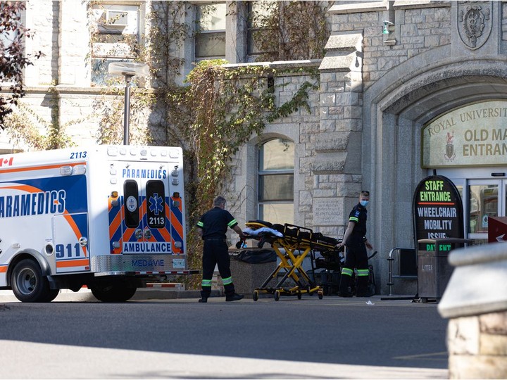  Paramedics bring a stretcher into the old main entrance at Royal University Hospital, where the U of S’s division of cardiology is based.