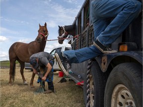 Colten Poitras files down a horses's shoe at the race track near his home on Saulteaux First Nation. The photo is part of a series submitted by photographer Michelle Berg to the News Photographers Association of Canada national pictures of the year awards. Berg won first place in the feature story category. Photo taken on May 16, 2021.