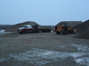 A photo taken by RCMP of Sheree Fertuck's semi and loader left at the gravel pit near Kenaston where she was last seen. (Court exhibit photo)