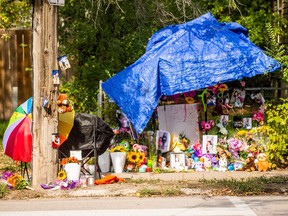 A memorial for Baeleigh Emily Maurice, who died after being hit by a truck while riding her scooter, has been set up on the 700 block of 33rd St W.