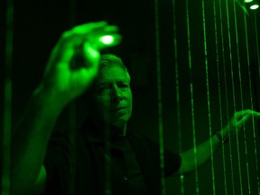 Rich Miller plays his laser harp which he created, in preparation for his instalment at the Nuit Blanche festival that is scheduled for Sept. 25.