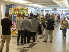 REGINA, SASK : September 17, 2021 -- There was a fairly long line of people waiting at the walk-in COVID-19 vaccine clinic at the Southland Mall on Friday, September 17, 2021 in Regina. TROY FLEECE / Regina Leader-Post