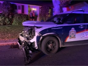 A 27-year-old man has been charged in connection to an incident in which a stolen vehicle struck two police vehicles, another vehicle and a house in Saskatoon on Monday, Sept. 20. Photo by Mark Zielke/Twitter.