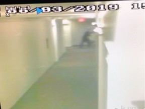 Screengrab of security camera footage of Joseph Simon Peter Yaremko in an apartment building on the 100 block of Wellman Crescent June 3, 2019, when he allegedly sexually assaulted a woman who lived in the building. Yaremko is seen pushing his way into the alleged victim's unit.