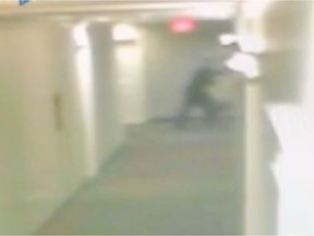 Screen grab of security camera footage of Joseph Simon Peter Yaremko pushing his way inside an apartment in the 100 block of Wellman Crescent on June 3, 2019. He sexually assaulted a woman who lived inside. (Court exhibit)
