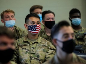 U.S. soldiers wait to be processed upon returning home from deployment in Afghanistan, at Fort Drum, New York, Sept. 6, 2021.