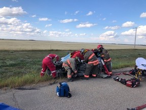 Firefighters working at the scene of a collision on Highway 41 on Sept. 1, 2021.