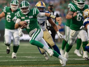 Saskatchewan Roughriders quarterback Cody Fajardo, 7, runs the ball Sunday during a 23-8 loss to the Winnipeg Blue Bombers at Mosaic Stadium.