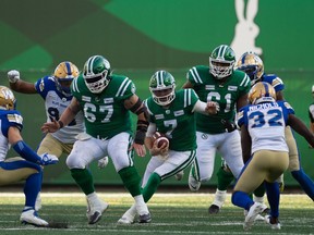 Saskatchewan Roughriders quarterback Cody Fajardo (7) carries the ball against the Winnipeg Blue Bombers in Sunday's Labour Day Classic. BRANDON HARDER/ Regina Leader-Post