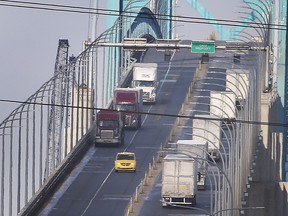 Traffic is shown on the Ambassador Bridge, which connects Detroit and Windsor.