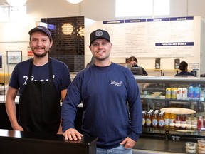 The Bagel Shop YXE co-owner Cole Dobranski, right, stands with employee Morgan Fiddler. The shop offers their own special combined Montreal and New York style bagel blend, with a full menu of sandwiches, spreads, snacks and drinks. Photo taken in Saskatoon, SK on Thursday, October 14, 2021.