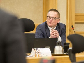 Coun. Darren Hill listens to a presentation at a city council meeting in Saskatoon, SK on Monday, November 25, 2019.