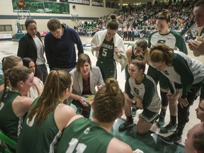University of Saskatchewan Huskies head coach Lisa Thomaidis speaks to her players on the bench in a game against the University of Alberta Pandas in the Canada West women's basketball conference final at the PAC on the U of S campus in Saskatoon on Friday, Feb. 28, 2020.