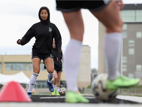 SASKATOON, SK-- 0917 sports huskies soccer - Huskies women's soccer players warm up before their practice at Griffith's stadium the day before their Canada West conference home-opener. Photo taken in Saskatoon on Thursday, Sept. 16, 2021.