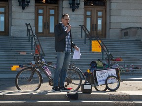 Larry Neufeld of Basic Income Saskatchewan is seen speaking at a rally in support of universal basic income at the Saskatchewan Legislative Building.