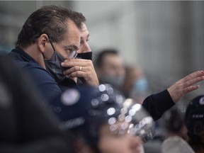 Melville Millionaires head coach Mike Rooney watches his team compete against Battlefords North Stars in the first game of the Saskatchewan Junior Hockey League Showcase event at Warman Legends Centre. Photo taken in Warman on Monday, Oct. 4, 2021.