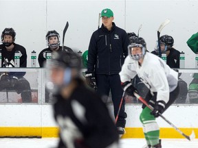 With assistant coach Nolan Horbach keeping a watchful eye, the U of S Huskies women's hockey team practises at Merlis Belsher Place in Saskatoon on Oct. 19, 2021.
