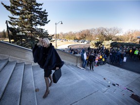 Independent MLA Nadine Wilson walks up the steps after speaking to and shaking hands with people in a large crowd in front of the Saskatchewan Legislative Building in Regina, Saskatchewan on Oct. 27, 2021. The gathering was a demonstration against proof of vaccine mandates and other pandemic measures.
BRANDON HARDER/ Regina Leader-Post