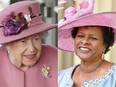 Queen Elizabeth II (L) and Dame Sandra Mason, who will be sworn in as president of Barbados on Nov, 30, 2021. Photo combination by Jacob King and JOHN STILLWELL / various sources / AFP