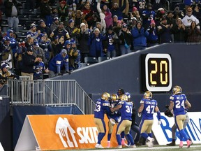 The plight of the CFL was evident on Saturday, when the Winnipeg Blue Bombers blanked the visiting B.C. Lions 45-0. The Bombers are shown celebrating a punt-return touchdown by Janarion Grant during the latter stages of the blowout.