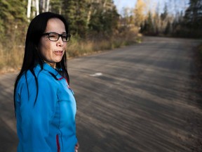 SASKATOON, SASK-- OCTOBER 3 2016 9999 LA RONGE -Lac La Ronge Indian Band chief Tammy Cook-Searson walks alongside the Montreal River in La Ronge, Saskatchewan on Monday, October 3rd, 2016. (Kayle Neis/Saskatoon StarPhoenix)