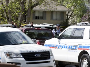 Police are seen working at the scene where 54-year-old Jones Raymond Oakes was pronounced dead. Jones was later announced as the city's seventh homicide victim of 2020.