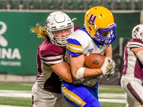 Regina Thunder linebacker Carter Stusek makes a tackle during his team's 30-27 victory over the Saskatoon Hilltops on Sept. 18 2021 at Mosaic Stadium in Regina (Wanda Harron photography)