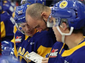 Saskatoon Blades assistant coach Dan DaSilva talks with players on the bench during first-period WHL action in Saskatoon on Wednesday, Oct. 27, 2021.