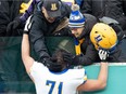 It was a final game for Saskatoon Hilltops offensive tackle Jonathan Chisholm, shown here being congratulated one week earlier after the Prairie Football Conference championship win over the Regina Thunder at Mosaic Stadium on Nov. 14. BRANDON HARDER/Regina Leader-Post