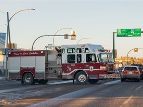 A fire truck backs into its berth at Fire Station 1 on Idylwyld Drive.