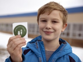 Miles McKellar, 11, was all smiles after receiving his first COIVD-19 vaccine on Wednesday, November 24, 2021 in Regina.