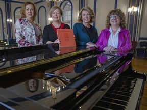 Marlene Hinz, from left, Carolyn Speirs, Dianne Burrows and Suzanne Williams of the Nightingales quartet rehearse at Government House for their Remembrance Day concert on Thursday at the Artesian.