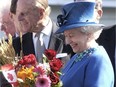 Queen Elizabeth and Prince Phillip make their way around on the walkabout outside the Synchrotron in Saskatoon after a tour there Thursday afternoon, May 19, 2005.